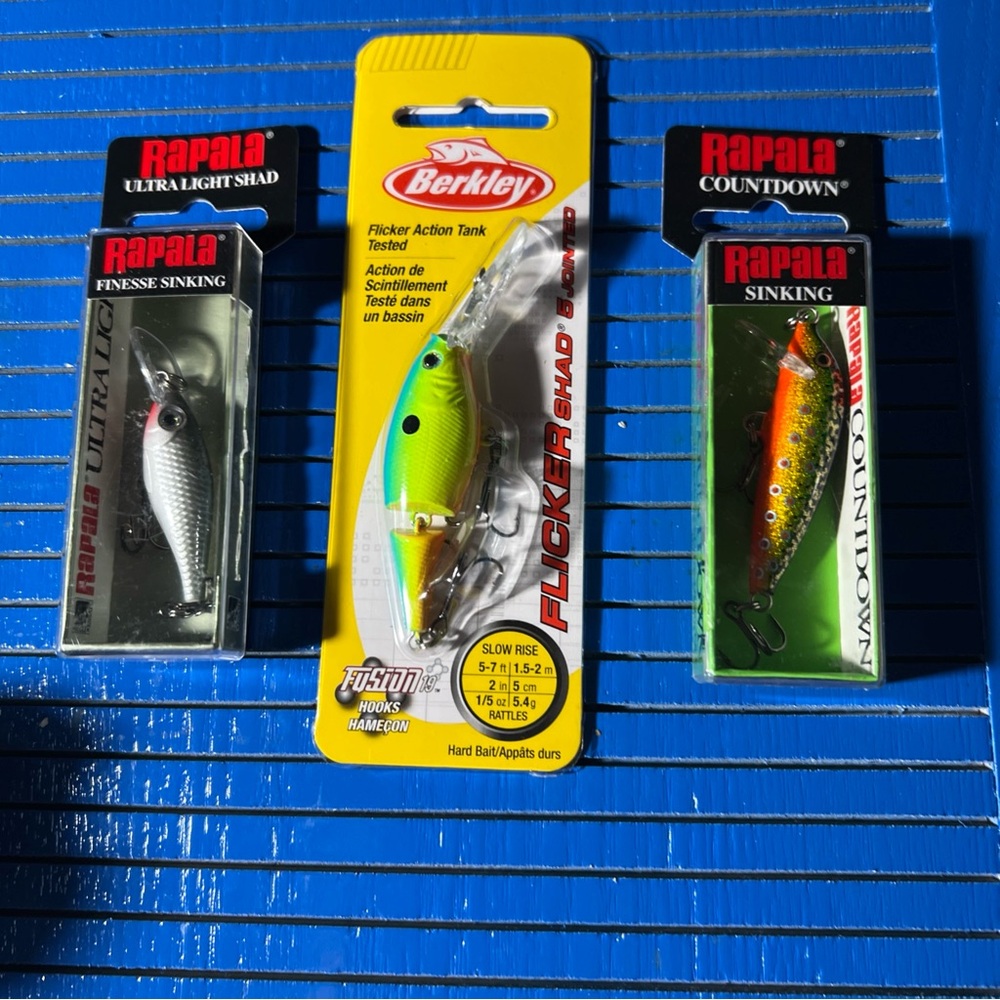 Three fishing lures brand new sealed